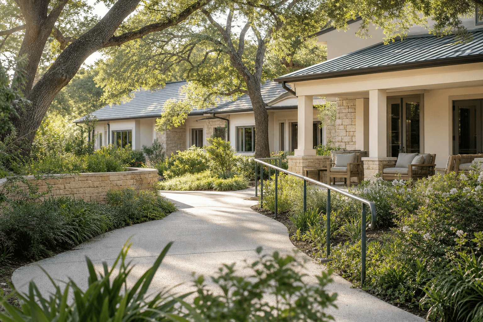 An accessible garden path approaching a warm residential building